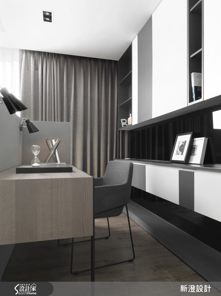 設計師為一家三口的 50 坪的預售屋，利用石材紋理與鏡